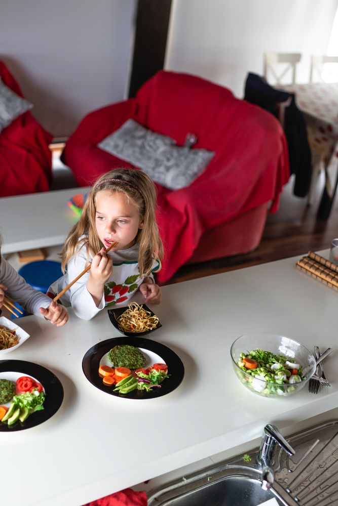 Girl eating vegan food at home