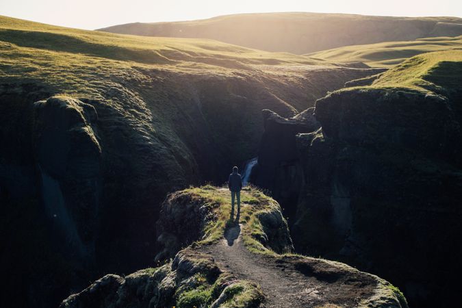 Man looking out over epic Iceland landscape