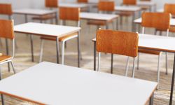 Empty chair in school classroom
