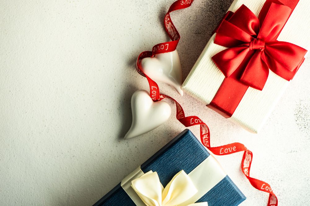 St. Valentine day concept of presents and ceramic heart decorations