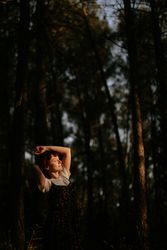 Woman walking in forest