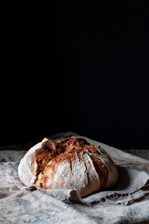 Country sourdough bread on wood