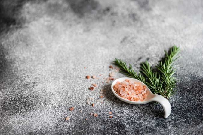 Table setting with rosemary and salt