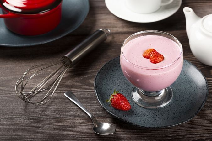 Delicious strawberry mousse in glass goblet.