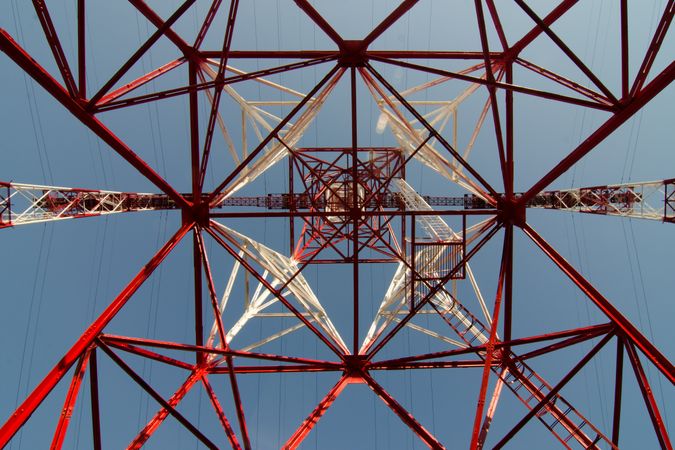 Low angle view of electric transmission tower