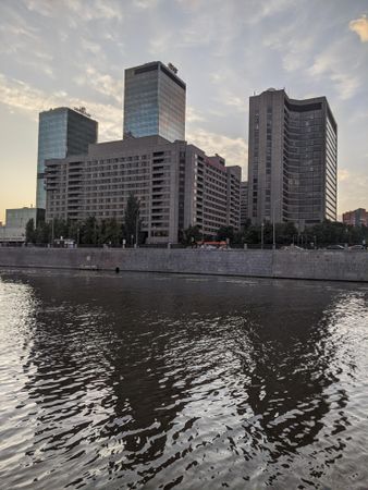 City buildings across body of water in Moscow, Russia