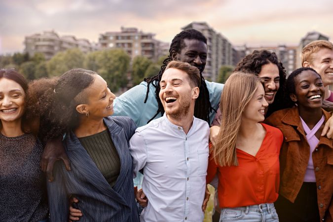 Joyful multi-ethnic friends together in the city