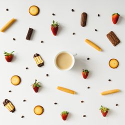 Coffee cup with cookies and coffee bean pattern on light background