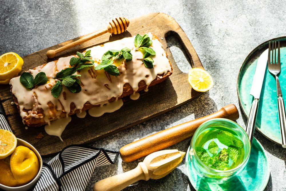 Tasty homemade lemon cake with fresh mint garnish