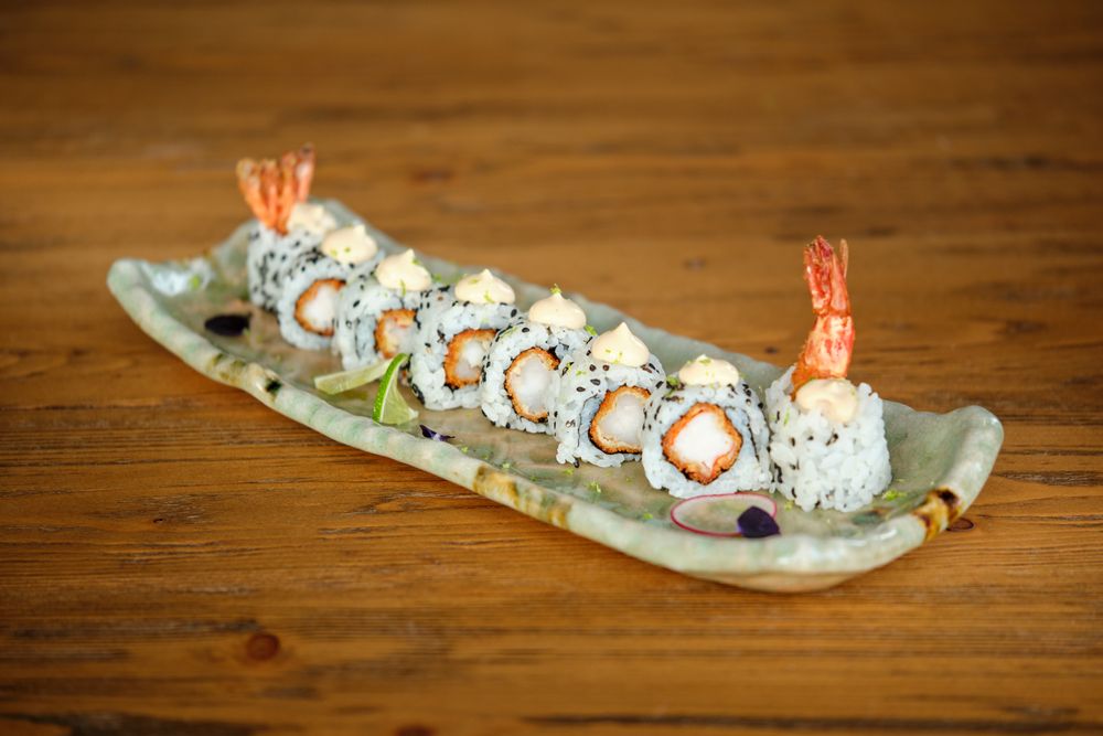 Appetizing sushi set on ceramic tray