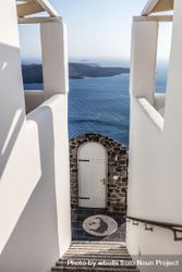 Stairs with gate leading down the Aegean Sea 41Dmp5