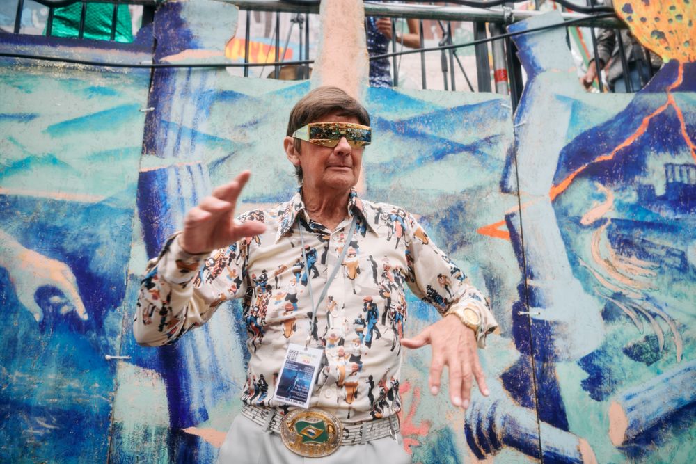 London, England, United Kingdom - August 28, 2022: Man in patterned shirt and reflective glasses