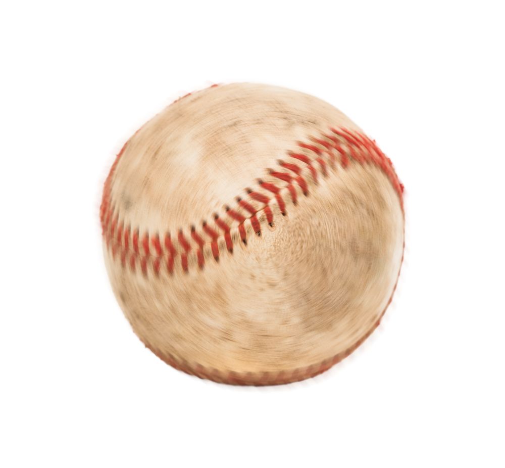Single Slightly Worn Spinning Baseball Isolated on Plain Background.