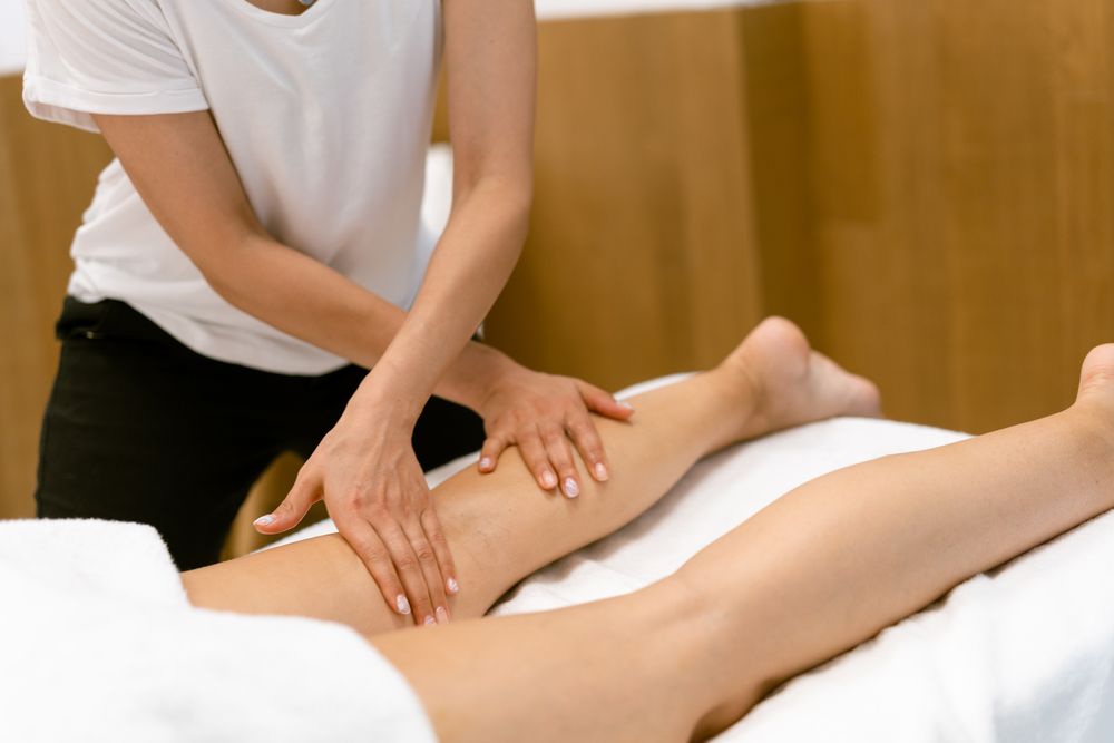 A female’s legs being massaged in a spa