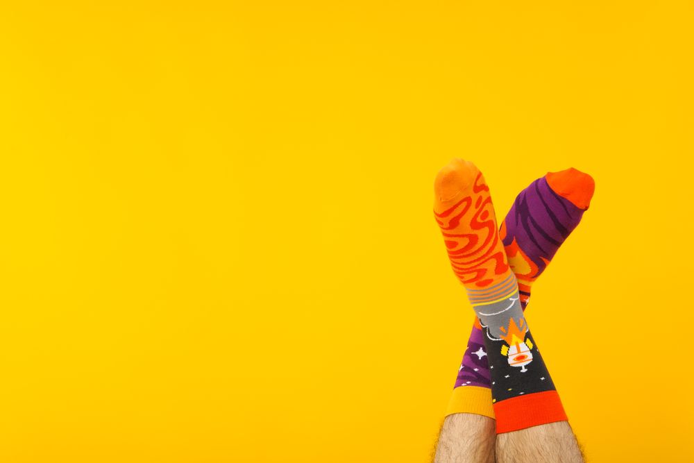 Concept of clothes for legs - socks, space for text