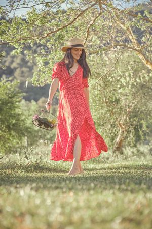 Young woman on stroll in forest