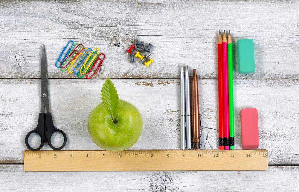 School supplies in line with ruler