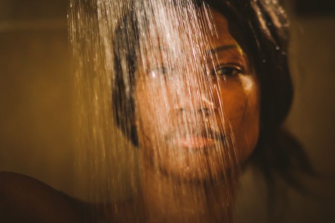 Black woman taking shower