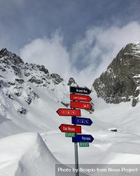 Red and blue road sign on in snow covered mountain in La Conversion, Vaud, Switzerland 5RBN15
