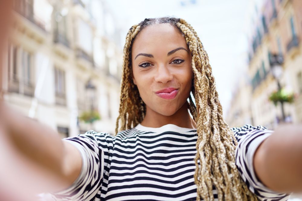 POV view of woman taking selfie