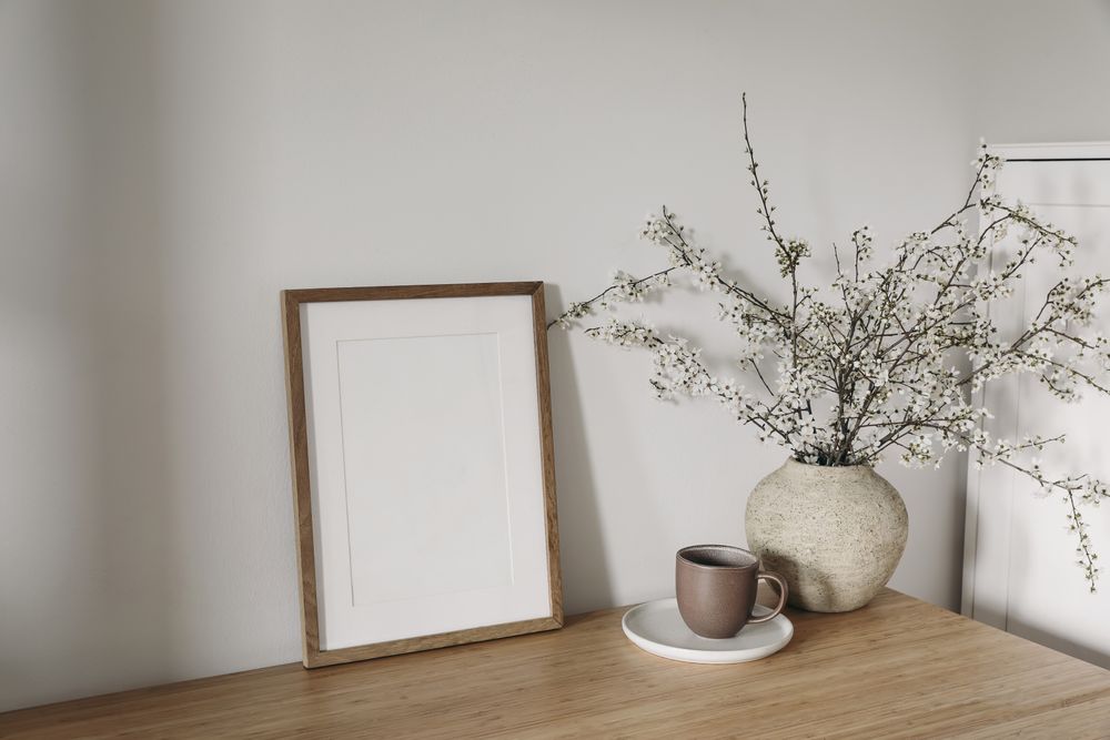 Vertical wooden picture frame, poster mockup in sunlight