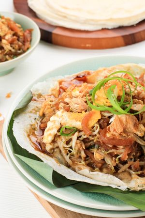 Thin Wrapper with Saute Spicy Soy Bean Sprout and Bamboo Sprout, add with Sticky Sweet Paste from Starch