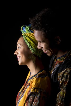 Couple of young Black people standing embracing