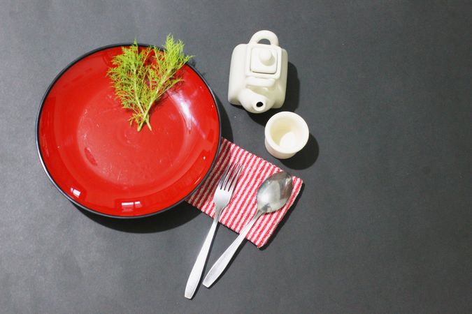 Dinnerware setting with a Touch of Red and Black