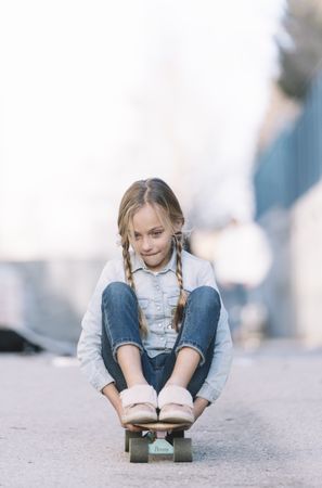 Kid playing with skateboard