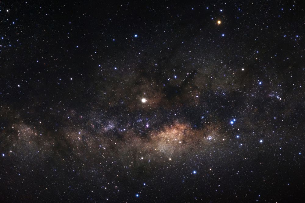 Milky way galaxy with stars and space dust in the universe, Long exposure photograph, with grain.