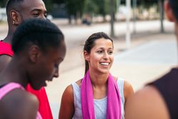 Team Spirit: Multiracial Friends Chatting and Bonding After a Fun Basketball Game