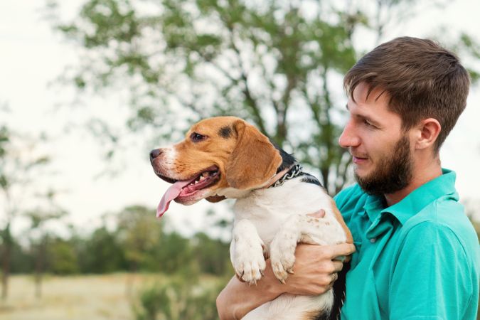 Portrait owner man with dog