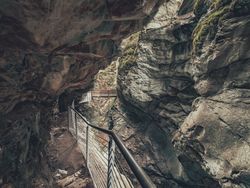 Hiking footpath with bridge in mountain area