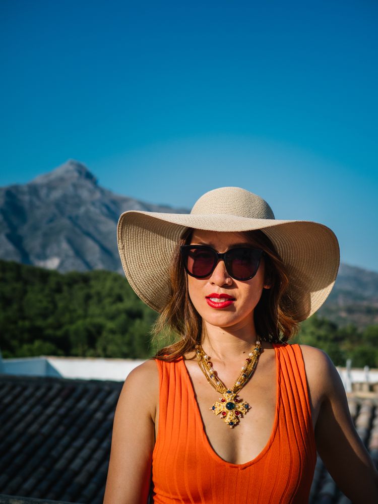 young elegant Chinese woman at mediterranean scenario
