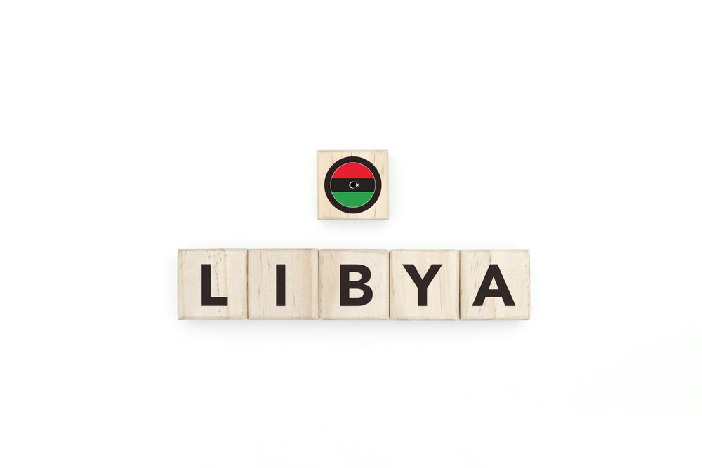Wooden blocks bearing the name and flag of Libya.