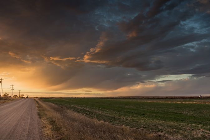 Dramatic sunset over rural country road