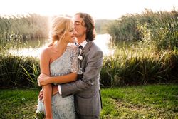 Happy newly wedded couple delighting in event at nature