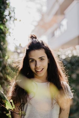 Cheerful woman in garden