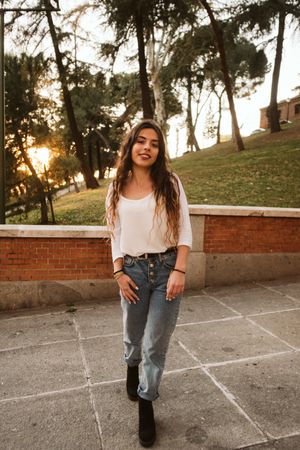 Cheerful young woman in street