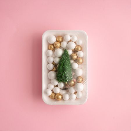 Christmas tree and ball decoration packed in plastic wrap