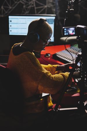 Black lady working at radio station