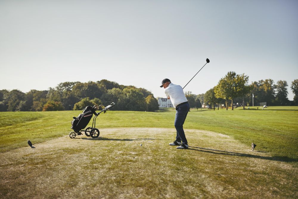 Man swinging golf club