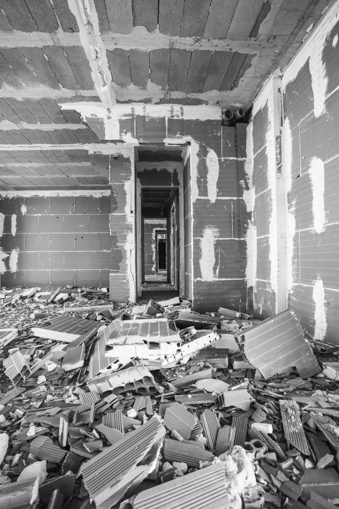 Building under construction with demolition waste