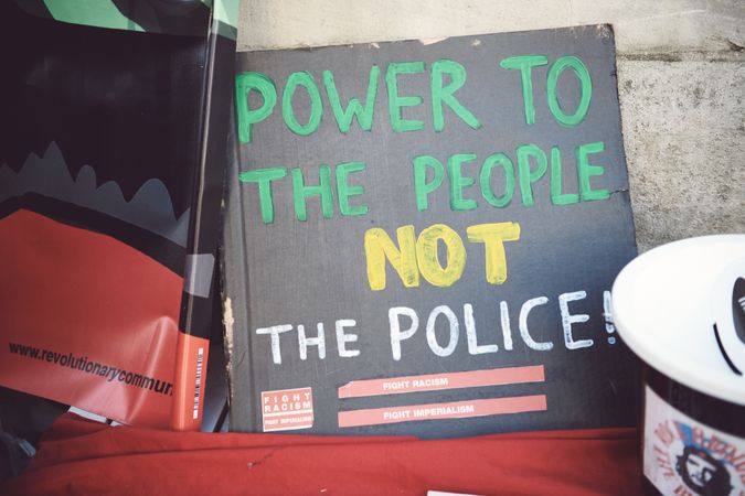 London, England, United Kingdom - March 19 2022: “Power to the People Not Police” sign