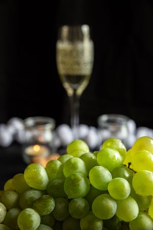 Glasses with wine and grapes