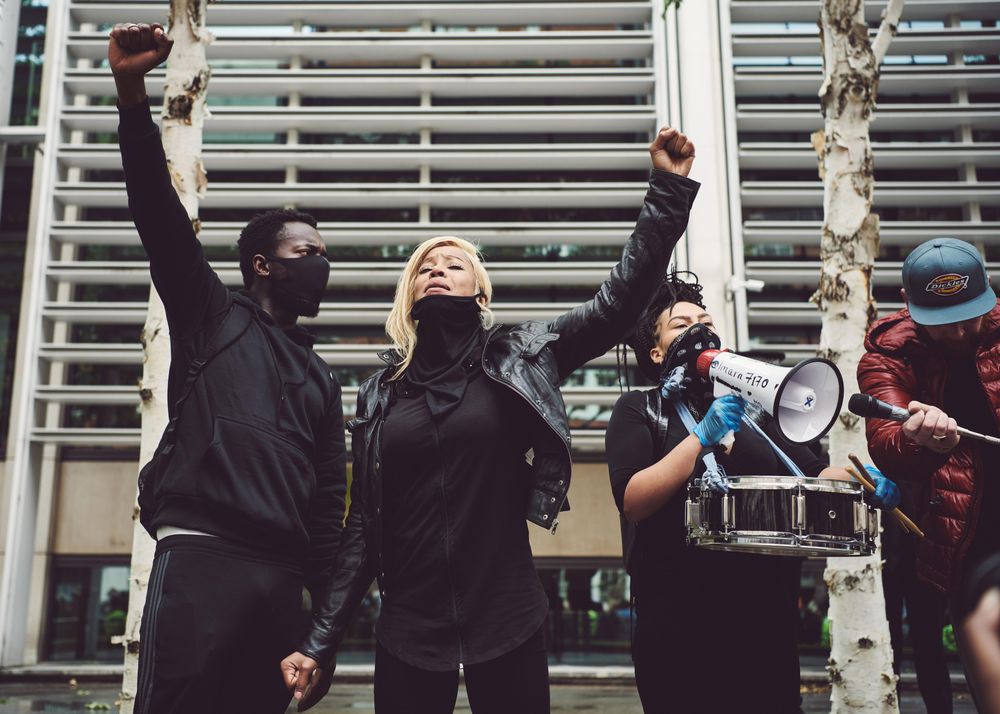 London, England, United Kingdom - June 6th, 2020: Group of people with raised fists at BLM protest