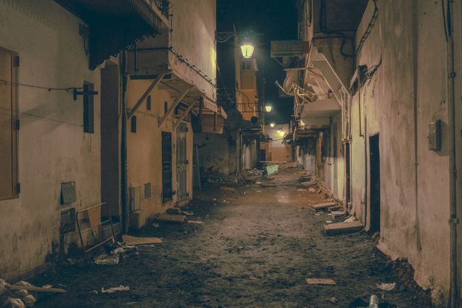 Old narrow street of town at night