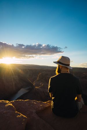Bearded traveler looking at canyon