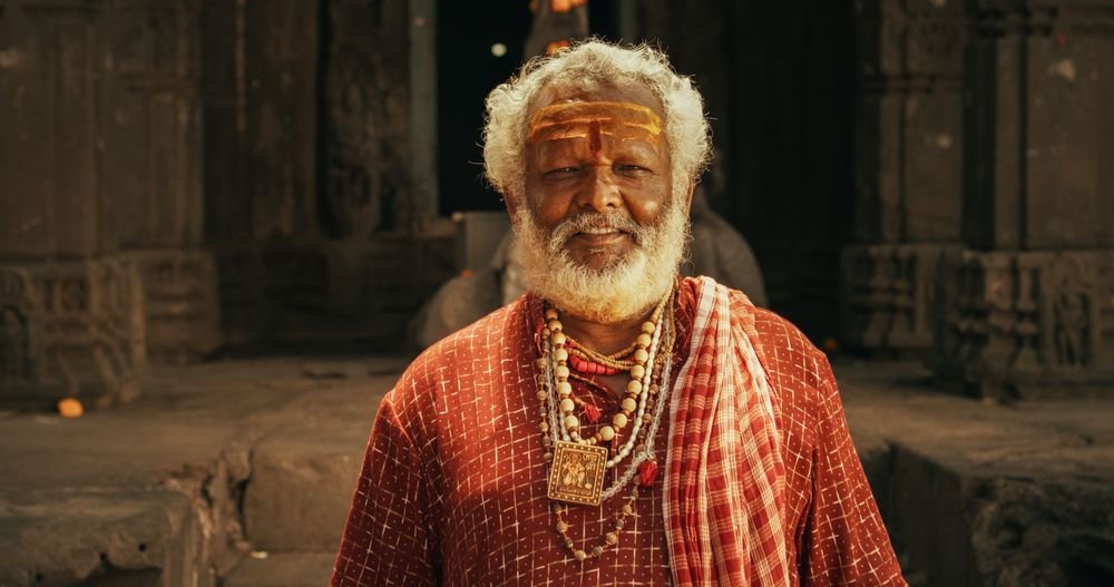Authentic Footage of Hindu Priest Talking to a Female Temple Follower and her Son