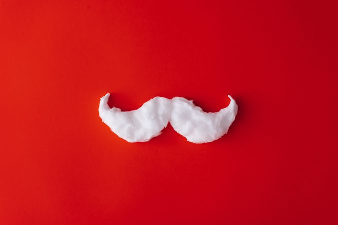 Mustache on red background